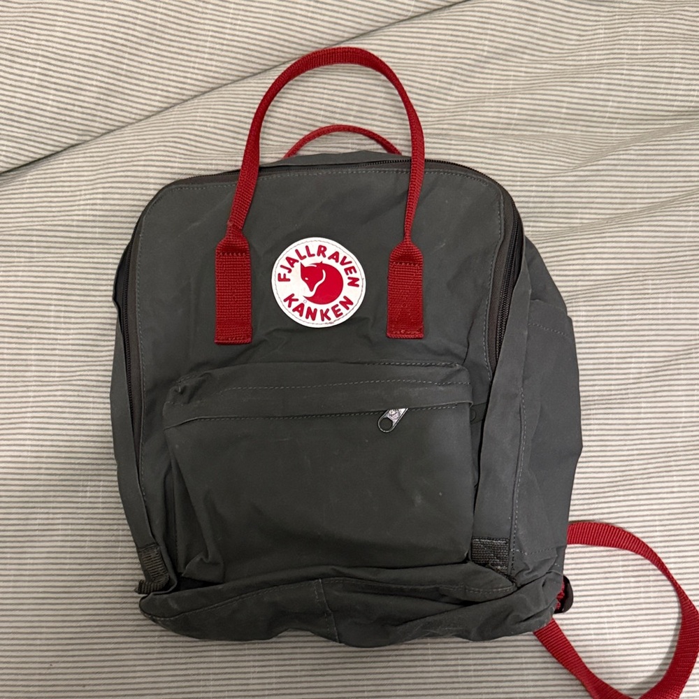 Fjallraven Kånken Gray Backpack with Red Accents